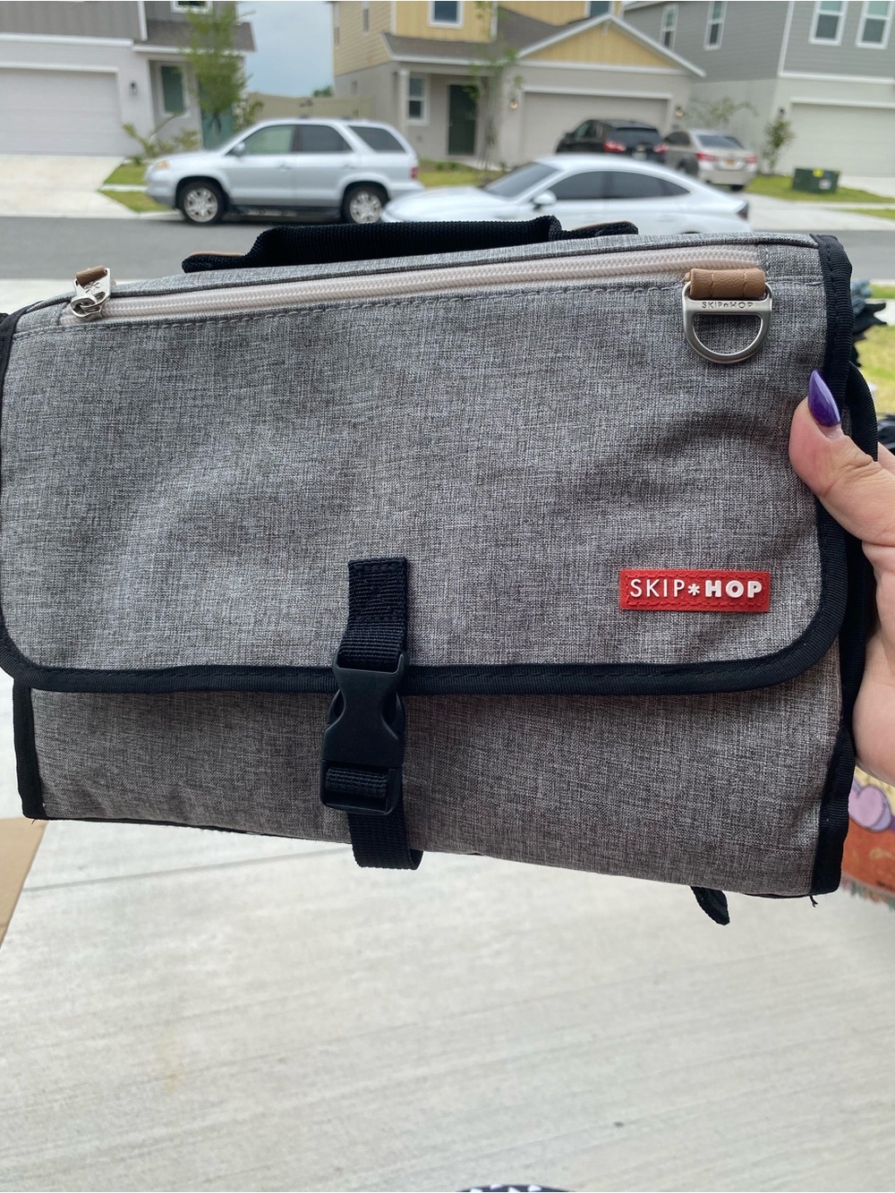 Skip Hop Gray and Black Men’s Hanging Toiletry Case with Red Logo